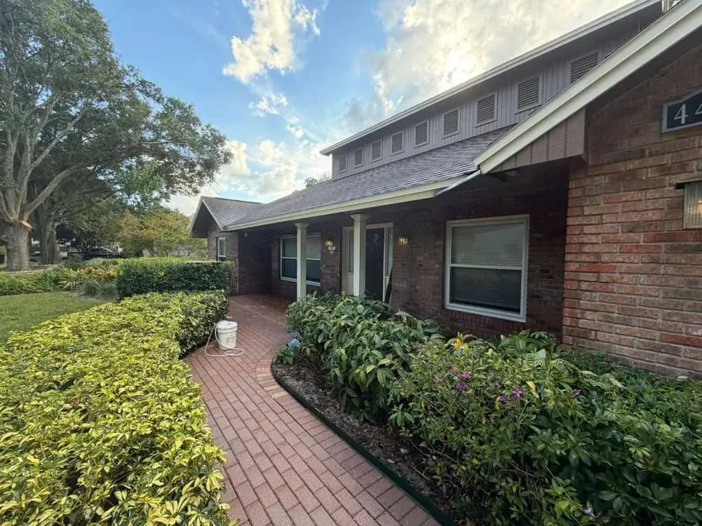 House exterior and brick walkway after washing