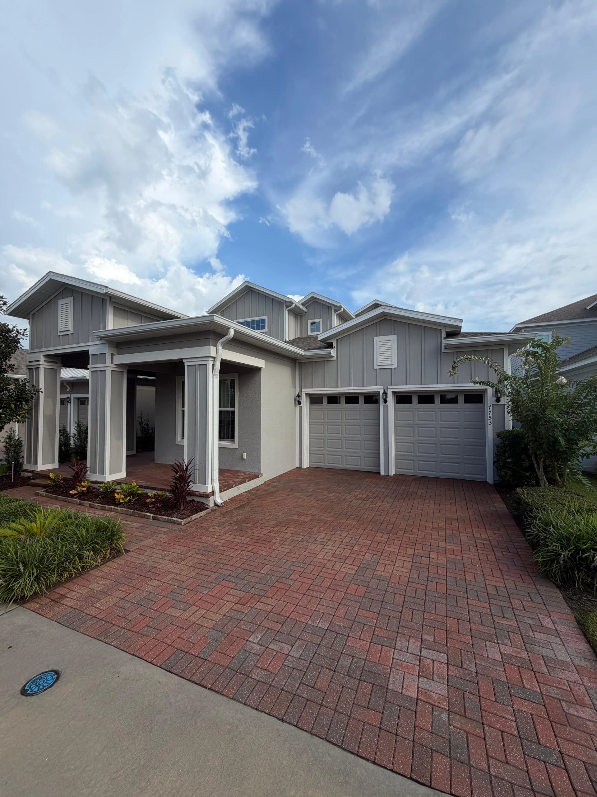 Pressure washing a residential driveway in Sarasota